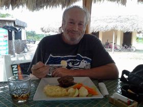 Having a nice meal in Blackbeards Beach Bar, Belize – Best Places In The World To Retire – International Living